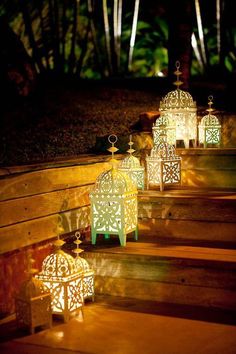 lanterns lit up on steps in the dark