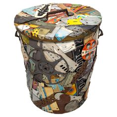 a trash can covered in lots of different things