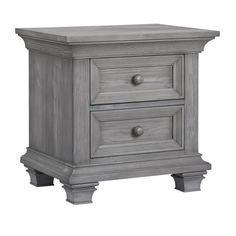 a gray nightstand with two drawers on top and one drawer in the bottom, sitting against a white background