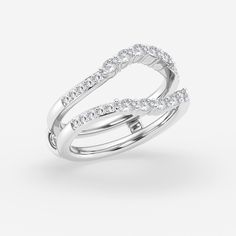 two white gold wedding rings with diamonds