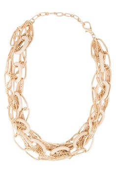 We've reimagined the dangling chain jewelry trend with our Nava Necklace. We gave these chains a modern twist by incorporating wood into the gold links. This necklace can be matched with any outfit, wear them solo or pair with our Nava Earrings and Bracelet. Size: Closed: 8", Open: 16", Width: 1" Lobster Clasp with Adjustable Chain Imported Multi-strand Chunky Chain Necklace, Chic Multi-strand Gold-tone Chain Necklace, Chic Gold-tone Multi-strand Chain Necklace, Chic Gold Chain Necklace, Chic Multi-strand Metal Chain Necklace, Chic Gold-tone Chunky Chain Necklace, Modern Chain Link Necklace, Chic Multi-strand Chain Necklace With Adjustable Chain, Chic Multi-strand Adjustable Chain Necklace