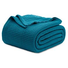 a blue blanket folded on top of each other