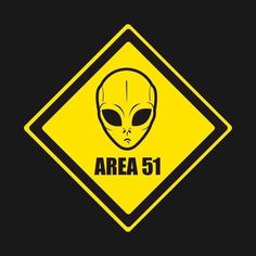 an alien crossing sign with the words area 51 in black and yellow, against a dark background