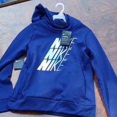 Blue Therma Hoodie By Nike New With Tags Nike Fleece Hooded Top, Nike Hooded Fleece Top, Nike Fleece Top With Adjustable Hood, Blue Long Sleeve Sports Hoodie, Nike Blue Hoodie For Fall, Blue Nike Hoodie For Fall, Nike Blue Hoodie With Adjustable Hood, Blue Winter Tops With Adjustable Hood, Blue Sportswear Hoodie With Adjustable Hood