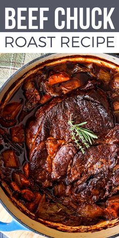 a pot filled with meat and vegetables on top of a wooden table