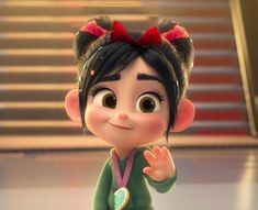 an animated character with black hair wearing a green shirt and red bow on her head