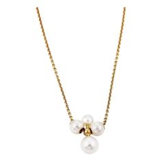 This lovely authentic necklace is by Mikimoto. It is crafted from 18k yellow gold. The pendant features a cross like design with a pearl on each point, the small pearl at the top and the larger size below. The two sides same size pearl. The chain is fitted through the two side pearls and it is signed by the designer with the metal content.    Material: 18k yellow gold  Hallmark: M K18  Measurement: Chain:  17" long  Pendant: 0.60" long x 0.48" wide   Pearls are: 4mm-6mm  Weight: 3.6 grams Elegant Cross Pendant Necklace With Pearl Drop, Elegant Pearl Drop Cross Pendant Necklace, Elegant Pearl Necklace With Cross Pendant, Pearl Necklace With Cross-shaped Pearl Pendant, Elegant Pearl Pendant Cross Jewelry, Elegant Pearl Cross Pendant Jewelry, Mikimoto Pearls, Long Pendant, Yellow Gold Pendants