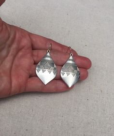 "These are simply stunning! My new personal favorite go to earrings! They have incredible detail and design. Versatile and perfect for everyday wear. Add instant style to any outfit with these beauties! The earrings measure 1 3/4\" long by 1\" wide. They hang from simple silver ear wire hooks. Overall drop length is 1 7/8\". Made from allergy free plated silver. I have a matching necklace in my shop if you would like the whole set. Here is a direct link https://etsy.me/3hNigJ4 Thanks for stoppin Bohemian Silver Teardrop Earrings, Bohemian Drop Pierced Earrings, Bohemian Nickel-free Drop Jewelry, Bohemian Sterling Silver Teardrop Plug Earrings, Bohemian Teardrop Sterling Silver Plug Earrings, Teardrop Metal Earrings For Festival, Teardrop Earrings With Ear Wire For Festival, Bohemian Teardrop Earrings With Ear Wire, Nickel Free Teardrop Earrings For Festival