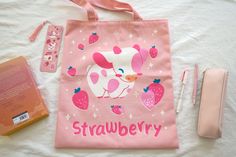 Cute tote bag featuring the strawberry milk cow Fresa surrounded by strawberries. This hand-sown tote bag is perfect for displaying a kawaii pink aesthetic while also being environmentally-conscious. - 15 inches tall by 14 inches wide - Two-sided artwork - Sublimation printed design - Machine washable - Air dry only for a long life! - Designed and shipped from the USA Pink Strawberry Print Bag As Gift, Pink Kawaii Bag With Cute Design, Trendy Pink Bag With Strawberry Print, Kawaii Cute Tote Bag, Playful Pink Cotton Bag, Trendy Pink Strawberry Print Bag, Cute Strawberry Print Bags For Everyday Use, Kawaii Tote Shoulder Bag For Shopping, Cute Strawberry Print Tote Bag