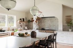 the kitchen is clean and ready to be used for dinner or other entertaining purposes in someone's home