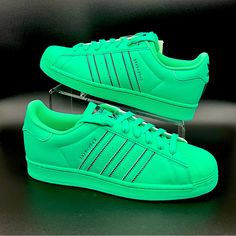 Adidas Original Men’s Superstar Gv9444 Sneakers Sz 8.5 Bold Adidas Superstar Shoes Made In Part With Recycled Content A Fixture On The Cultural Scene For More Than 50 Years, The Adidas Superstar Shoes Are One Of The Most Iconic Adidas Sneakers Ever Created. The Adidas Superstar ‘Hi-Res Green’ Transforms The Iconic Shell-Toed Silhouette With A Monochrome Finish In An Eye-Catching Emerald Hue. Made In Part With Recycled Content, The Leather Upper Features Contrasting Black Accents On The Sneaker’s Adidas Green Custom Sneakers For Sports, Sporty Green Adidas Custom Sneakers, Adidas Custom Green Sporty Sneakers, Adidas Green Sneakers With Translucent Outsole, Adidas Green Low-top Custom Sneakers, Adidas Sporty Green Custom Sneakers, Adidas Green Sneakers With Breathable Toe, Adidas Superstar Green, Green Adidas Sneakers With Logo