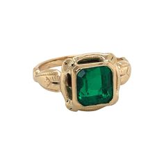 Regally displayed in it's beautiful fancy antique ten karat 10K yellow gold setting, this vibrant green step cut 2.33 carat emerald gemstone emotes the spiritual meaning of love and hope. GIA certified as an octagon step cut green natural beryl emerald measuring 7.80 x 7.36 x 5.56 mm, transparent with F1 clarity. Currently in ring size 7 and resizable at no additional cost. Gift boxed and accompanied by GIA Certificate Number 110211332464.