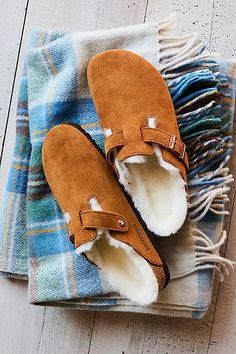 **Fit:** Narrow: A-B Width Classic slip-on Birkenstock open-back clogs in a cozy update, featuring a super soft shearling lining. * Full arch support * To grip * EVA outsole A Birkenstock narrow width fit is comparable to a Medium (B Width). | Boston Shearling Birkenstock at Free People in Tan, Size: EU 36 Boston Shearling Birkenstock, Shearling Birkenstock, Birkenstock Shearling, Boston Shearling, Birkenstock Boston Shearling, Birkenstock Mules, Birkenstock Clog, Clogs Outfit, Free People Store