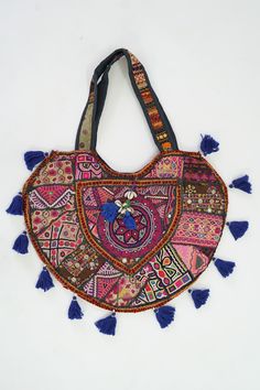 WELCOME TO YOUR SHOP CHANDRA TEXTILES !! This gorgeous Indian Jaipuri Morral is perfect to style with any outfit! It is completely hand-embroidered and made on a waist loom, These beautiful bags are handmade by Indian artisans in Jaipur, Rajasthan. Material - 100% Cotton Fabric, The bag closes with a High-Quality zipper. Our bags are strictly produced by our skilled team with the natural traditional way of craftsmanship. A Perfect Shoulder Bag / Hobo Bag / Tote Bag / Hand Bag to give to an elega Traditional Handmade Multicolor Embroidered Hobo Bag, Traditional Handmade Multicolor Embroidery Hobo Bag, Embroidered Multicolor Hobo Tote Bag, Festival Embroidered Multicolor Hobo Bag, Handmade Multicolor Embroidered Hobo Bag For Festivals, Traditional Handmade Multicolor Hobo Bag, Traditional Multicolor Embroidered Hobo Shoulder Bag, Traditional Multicolor Embroidered Hobo Bag, Multicolor Bags With Traditional Patterns For Everyday Use