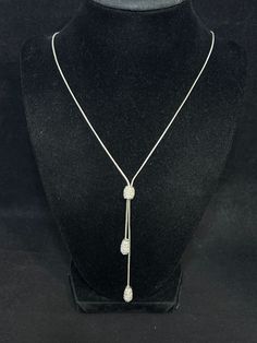 "Napier Silver Tone And Rhinestone Bolo Necklace. It has the metal rectangle tag that is stamped Napier. It has a lobster clasp. The necklace measures: 24\" It comes with a gift box. (Jewelry # 4263) USA Seller!! Estate sale find. We do not Clean or Polish our Estate Jewelry we will leave that to you. We also have Jewelry, Hallmark Ornaments, Dept 56, Vintage Glassware and many other items. We will combine shipping for multiple items if possible. Features: * Bolo Size: Womens 24\" Condition: Pre-Owned Like New" Silver Adjustable Rhinestone Dangle Necklace, Adjustable Sparkling Silver Necklace, Adjustable Rhinestone Bling Necklace For Gift, Silver Crystal Lariat Necklace Gift, Silver Crystal Lariat Necklace As Gift, Silver Crystal Lariat Necklace For Gift, Silver Rectangular Pendant For Party, Adjustable Silver Sparkling Rhinestone Necklace, Silver Dangle Rhinestone Necklace For Gift