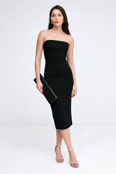 When sleek is spectacular. Our strapless midi Natalia Dress is the versatile LBD you’ve been waiting for, now in an updated no-slip design. Our soft, structured and mid-stretch European ponte fabric lined with soft mesh gives her a smoothing fit, while her sleek silhouette makes Natalia effortless to dress up or down. Wear her to date-night cocktails just as easily as you might to run around the corner—Natalia will go everywhere with you. | Yada, in black, is 5'9" (175 cm) tall, wearing size XS. Elegant Bodycon Midi-length Strapless Dress, Elegant Bodycon Midi Strapless Dress, Chic Bandeau Midi Dress, Chic Bandeau Bodycon Dress, Sleek Strapless Bodycon Dress For Formal Occasions, Fitted Bandeau Midi Dress For Night Out, Chic Bandeau Midi Dress For Date Night, Chic Bodycon Bandeau Midi Dress, Chic Bandeau Bodycon Midi Dress