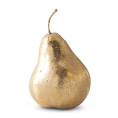 a golden pear on a white background