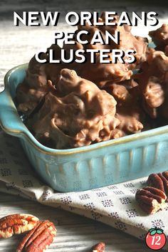 a blue bowl filled with pecan clusters