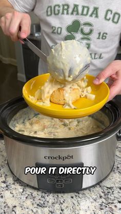 a person scooping ice cream out of a crock pot