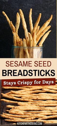 sesame seed breadsticks in a glass jar with text overlay reading sesame seed breadsticks stay crispy for days