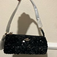 Beautiful Coach Barrel Bag New With Tags. Please Post Any Questions You May Have And Check My Closet For Additional Items In The Coordination Coach Sets! Shoulder Bag With Silver-tone Hardware For Night Out, Luxury Black Sequined Bags, Clutch Bags With Silver-tone Hardware For Night Out, Silver-tone Clutch Bag For Night Out, Event Shoulder Bag With Sequins, Sequin Shoulder Bag For Events, Coach Rectangular Evening Bags, Coach Shoulder Bag With Removable Pouch For Evening, Luxury Coach Bag For Party