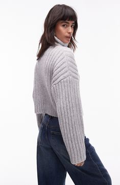 A chunky rib adds extra cozy points to a wool-kissed sweater knit to a cute, cropped length. 22" length (size Medium) Turtleneck Long sleeves 95% polyester, 5% wool Machine wash, line dry Imported Ribbed Turtleneck Cropped Sweater For Layering, Trendy Cropped Sweater For Winter, Soft Knit Cropped Sweater For Layering, Cropped Winter Sweater For Layering, Cropped Soft Knit Sweater For Layering, Trendy Cropped Winter Sweater, Trendy Cropped Sweater With Ribbed Collar For Fall, Trendy Ribbed Collar Cropped Sweater For Fall, Cropped Textured Knit Sweater For Fall