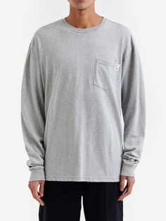 Elevate your basics with this classic grey longsleeve crewneck t-shirt. Features a breast pocket. 220 GSM 100% Cotton Long Sleeve Crewneck *Model is 5'11" and wears a size Medium. Heather Grey Long Sleeve T-shirt For Streetwear, Long Sleeve T-shirt With Pockets For Fall, Fall Long Sleeve T-shirt With Pockets, Basic Crew Neck Sweatshirt With Pockets, Heather Grey Long Sleeve Relaxed Fit T-shirt, Gray Long Sleeve Sweatshirt With Side Pockets, Basic Gray Long Sleeve T-shirt, Basic Long Sleeve Gray T-shirt, Everyday Long Sleeve T-shirt With Pockets