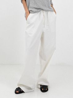 Composition : Cotton 85% Linen 15%Country of Origin : Republic of Korea Relaxed White Wide-leg Bottoms, Relaxed White Wide-leg Pants, Relaxed White Straight Bottoms, Relaxed White Straight Pants, White Relaxed Straight Pants, Relaxed White Pants For Workwear, Relaxed White Wide Leg Pants For Spring, White Linen Wide Leg Casual Pants, Casual White Linen Wide Leg Pants