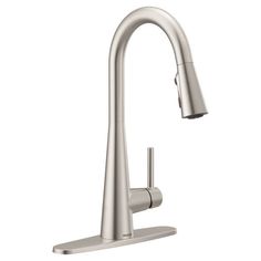 the kitchen faucet is shown in stainless steel with an angled spout and side spray