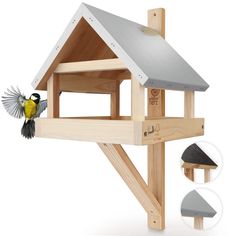 the bird house is made from wood and has a metal roof