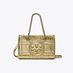 The Mini Fleming Soft Chain Tote is made of subtly distressed leather with a grid pattern. Finished with a bombé Double T, it can be carried or worn crossbody. Tory Burch Fleming Bag, Tory Burch Fleming, Closet Sale, Quilted Tote Bags, Womens Designer Handbags, Quilted Totes, Mini Tote Bag, Tory Burch Handbags, Designer Crossbody Bags