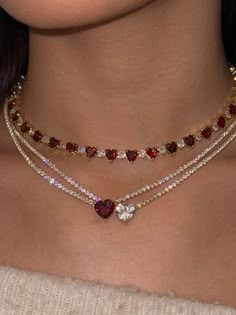 As seen on The TODAY Show! This bestselling bling bling beauty is made with premium-quality heart-shaped crystal and 925 Sterling Silver, the Gumdrop Necklace is 18K plated and hypoallergenic. Now available in: Deep Red (gold plated) White (gold plated) Ocean Blue (gold plated) Baby Pink (gold plated) Icy White (rhodium plated silver) Pitch Black (gold plated) Measures at about 16" long, with an 1" long adjustable gold clasp closure. Sterling Silver Flower Bracelet, Pink Gold Necklace, Silver Flower Bracelet, Fashion Girly, Pitch Black, Tennis Necklace, Sterling Silver Flowers, Flower Bracelet, Today Show