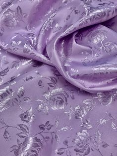 Priced per yard. Lavender satin jacquard. 60-inches wide. Great weight for ballet bodices and men's tunics/jackets. Can be used on the shiney or the matte side. Wedding Purple Brocade Dupatta, Wedding Brocade Purple Dupatta, Silk Jacquard Fabric, Unstitched Purple Brocade Saree, Jacquard Satin Fabric, Tunics, Alexander Mcqueen Scarf, Bodice, Lavender