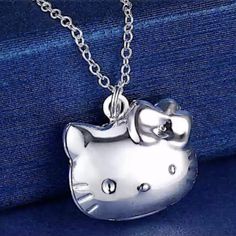 Sterling Silver Hello Kitty Pendent Locket Necklace Necklace Chain Measures 45 Cm. Pendent Measures 2.5 Cm/ 2.5 Cm Necklace Sizes Available 16in 18in 29in 24in Please Message Me Any Other Size Other Than 18in Other Listings Include 18k Gold Plated Sterling Silver 10k 14k 18k 24k 6mm 8mm 10mm Engagement Band Diamond Necklace Bracelet Bangle Earring Milgrain Lariat Eternity Ring Stone Tear Drop Pear Stone Carat Black Sapphire Cut Carat Daisy Anniversary Fine Coin Vintage Style Jewelry Bridal Onyx Cat Pendant Necklace, Cat Pendant, Wedding Accessories Jewelry, Vintage Style Jewellery, Cat Pendants, Cat Necklace, Christmas Gift Jewelry, Wedding Jewellery Necklace, New Metal