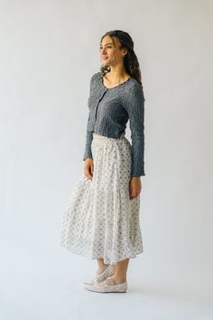 Get ready to twirl in style with the Antosh Tiered Patterned Midi Skirt! This cream-colored skirt features playful tiers and a unique pattern for a fun and quirky look. Perfect for adding personality to any outfit, this skirt will have you feeling confident and stylish. Details self/lining: 100% polyester Fabric Care Guide Here Sizing & Fit Measurements are approximate and taken while laying flat across the front. Not doubled. small: waist = 14"; length = 33" medium: waist = 15"; length = 33" la Patterned Midi Skirt, Midi Skirt Pattern, Feeling Confident, Ribbed Cardigan, Small Waist, Feel Confident, Unique Patterns, Fabric Care, In Style