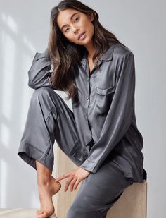 Menswear-inspired styling adds an air of classic elegance to whisper-light silk pajamas. Elegant Relaxed Fit Sleepwear For Spring, Elegant Silk Sleepwear With Relaxed Fit, Elegant Solid Color Sleepwear With Relaxed Fit, Elegant Solid Color Relaxed Fit Sleepwear, Elegant Fall Sleepwear, Elegant Fall Sleepwear For Loungewear, Elegant Relaxed Fit Sleepwear For Loungewear, Elegant Fall Sleepwear For Lounging, Elegant Long Sleeve Relaxed Fit Sleepwear