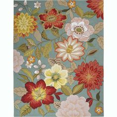 an area rug with flowers and leaves on it