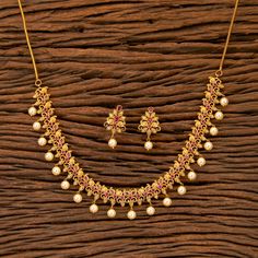 South Indian Bridal Traditional with matte gold plating Necklace Set with Earrings. Temple choker set. Gorgeous 24 K gold plated. This Necklace set comes in a beautiful gift box, making it an ideal gift for birthdays, weddings or anniversaries. Occasion: Perfect choice for any Indian occasion. Care: It is advisable that you keep products away from direct heat, humidity, and moisture. It is best to preserve your jewelry in the bag/box provided with the package. 100% Satisfaction Guarantee, Highes Lakshmi Design Gold Necklace, Jewelry Patterns Gold Necklace, Traditional Jewelry Gold, Gold Indian Necklace, One Gram Gold Necklace, Guttapusalu Necklace, Gold Necklace Price, Matte Gold Necklace, Simple Gold Necklace