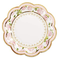 a plate with pink flowers on it and blue trim around the edge, against a white background