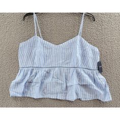 Lucky Brand Linen Blend Striped Camisole Crop Top Women'S Xxl Blue Sleeveless Lucky Brand Linen Blend Striped Camisole Crop Top Women's Xxl Blue Sleeveless Retail $59.50 This Lucky Brand Camisole Is A Perfect Addition To Your Summer And Spring Wardrobe. The Blue Striped Design Adds A Touch Of Casual Elegance To Any Outfit. The Sweetheart Neckline And Relaxed Fit Make It Comfortable To Wear For Any Occasion. The Pullover Closure And Sleeveless Design Make It Easy To Wear And Perfect For Laye Casual Blue Camisole Tank Top, Blue Spaghetti Strap Vest Top, Blue Camisole Top For Summer, Blue Sleeveless Camisole For Summer, Casual Blue Vest Crop Top, Blue Camisole Vest For Summer, Cotton Vest With Spaghetti Straps For Spring, Blue Camisole Crop Top With Vest Detail, Casual Blue Spaghetti Strap Top