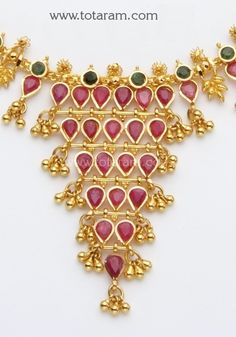 22 Karat Gold Necklace & Long Earrings set with Rubies & Emeralds and intricate workmanship. 
  Gross Gold Weight: 25.900 - 26.900 grams
  Ruby & Emerald Weight: 15.0 Carats
  Length of Earrings : 0.80 inches 
  Width of Earrings : 0.45 inches 
   - 235-GS461 - in 26.900 Grams for USD $2482.29. 
Made in India by Totaram Jewelers Online this product is in Gold - 22 Karat BIS Hallmark 916 KDM Gold  & is an excellent gift for Adult - Women. Ships fully insured with secured guara Luxury Yellow Gold Temple Necklace With Ruby, Gold Ruby Necklace, Gold Long Necklace, Ruby Necklace, Gifts For Adults, 22k Gold, Long Earrings, Long Necklace, Earring Set