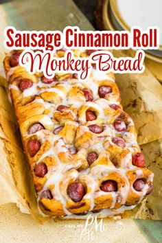 sausage cinnamon roll monkey bread with white glaze on top and text overlay reading sausage cinnamon roll monkey bread