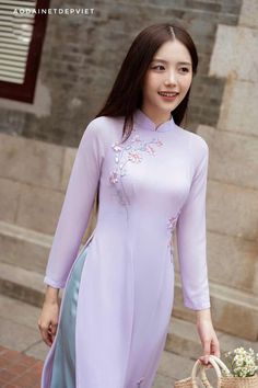 "🌿 This set includes traditional Ao Dai, pants. Style: Traditional Material: Very well made with high-quality silk Collar: traditional collar Please provide bust-waist-and hip measurements when placing your order to ensure the best fit for you. 🌿 NOTE: * Recommend gentle washing * Please contact us for any inquiries about size. We don't have an exchange policy for the wrong size * It is safe for a washer and dryer in a \"delicate\" setting. * Actual Ao Dai colors may differ up to 10% due to lightning and viewing devices. * These ao dai pants are made based on Vietnamese size; they will run smaller than American size. *3D printed ao dai: you may see some white broken fabric around the seam (collar). *There might be some chalk/ pen writings on the fabric because it is brand new, unwashed a Spring Long Sleeve Sets For Traditional Ceremonies, Fitted Sets With Floral Embroidery For Ceremony, Traditional Full-length Sets For Spring, Traditional Full-length Spring Sets, Traditional Full Length Sets For Spring, Fitted Floral Embroidery Set For Ceremony, Embroidered Long Sleeve Ao Dai For Ceremony, Traditional Purple Long Sleeve Sets, Embroidered Purple Sets For Traditional Ceremonies