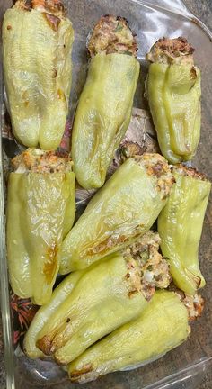 some stuffed peppers are in a plastic container