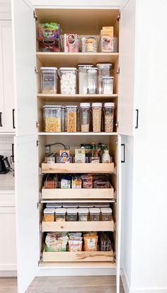 an organized pantry with lots of food in it