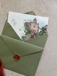 an open envelope with a stamp on it