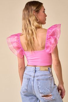 Flaunt your inner princess in this Mariana Puff Crop! Featuring a sweet pink organze mesh ruffle sleeve, this adorable crop is sure to turn heads (and make you look like royalty!) Ready to “pouf” your wardrobe up? Get this crop and watch the compliments roll in. Life Size Barbie, Fashion Leaders, No Closure, Concert Fits, Crop Top Tees, Small Crop Tops, Cropped Style, Bubblegum Pink, Life Size