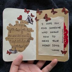 someone is holding an open book with music notes and butterflies on it that says, i hope you find someone who knows how to make your heart sing