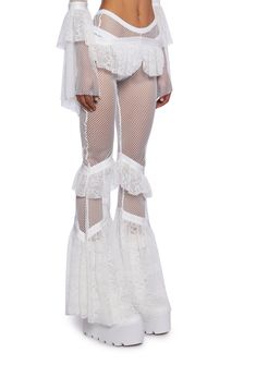 in this world, it's all about balance. These pants have a sheer fishnet construction, a high-rise waist with a strappy design, ruffled lace trim at the hips and knees, and a flared leg silhouette. Sheer White Pants, All White Rave Outfit, White Costume Women, Hippie Rave Outfits, Sheer Pants Outfit, Rave Inspo Outfits, White Rave Outfits, Diy Rave Outfits, Lace Bell Bottoms