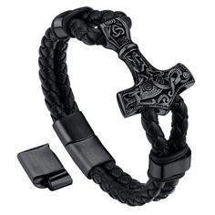 a black leather bracelet with an iron cross on it